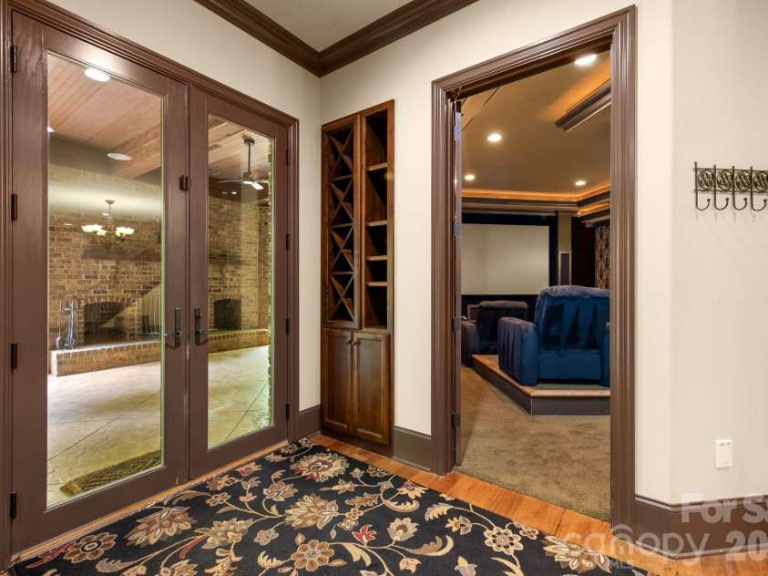 3565 Trinity Church Drive, Concord, NC 28027.  MLS# CAR4373119, YatesRealty ID 20249. Wine Rack - Theater