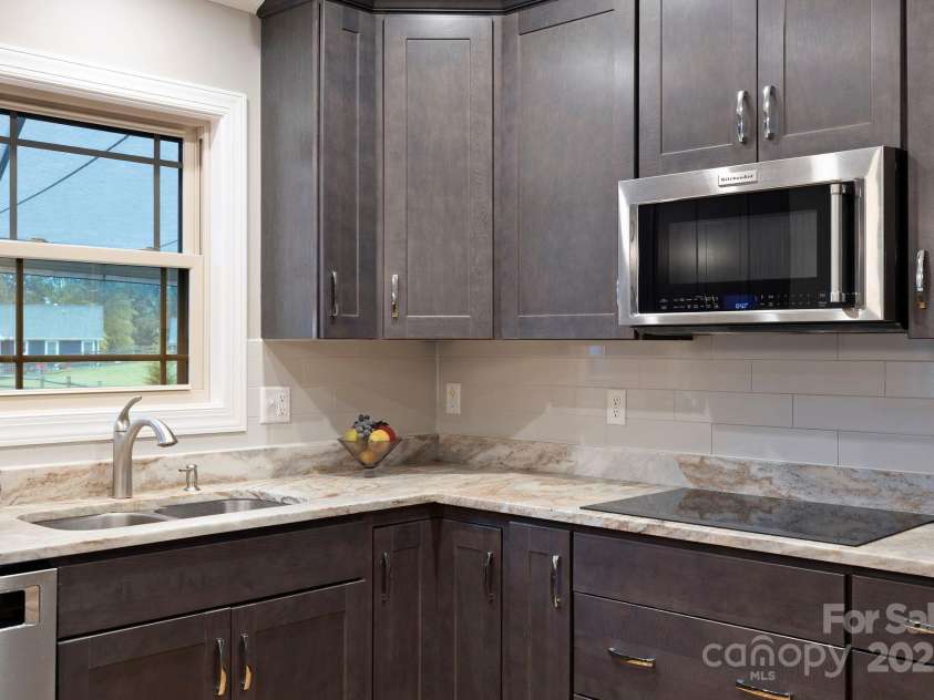 288 Ollie Weaver Road, Weaverville, NC 28787.  MLS# CAR4269198, YatesRealty ID 20259. Chef's kitchen feature inductive heating