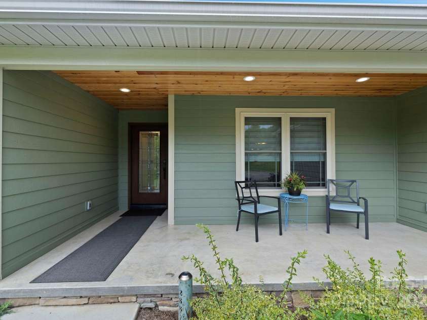 288 Ollie Weaver Road, Weaverville, NC 28787.  MLS# CAR4269198, YatesRealty ID 20259. Inviting front porch w/recessed lighting