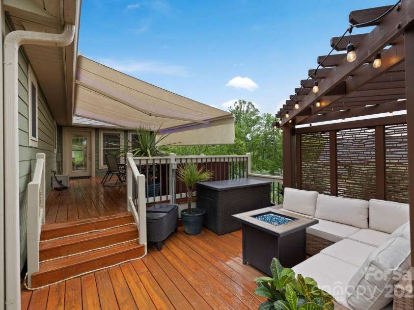 288 Ollie Weaver Road, Weaverville, NC 28787.  MLS# CAR4269198, YatesRealty ID 20259. Pergola w/hot tub and retractable awning