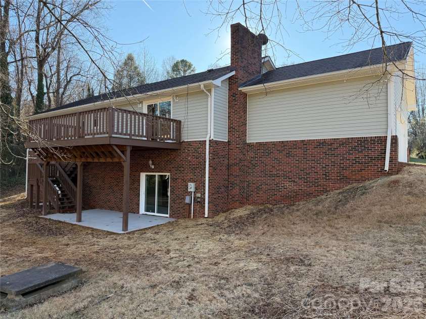 424 Holland Drive, Statesville, NC 28677.  MLS# CAR4335515, YatesRealty ID 2026. Rear of house with new patio and deck areas