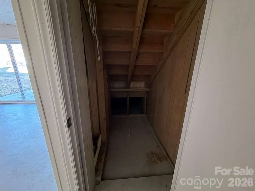 424 Holland Drive, Statesville, NC 28677.  MLS# CAR4335515, YatesRealty ID 2026. Under stairs storage in basement