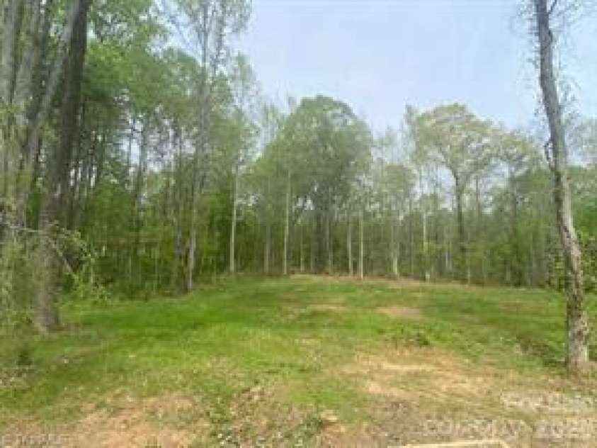140 Overbrook Road, Salisbury, NC 28147.  MLS# CAR4349590, YatesRealty ID 20263. Acreage to left of house.