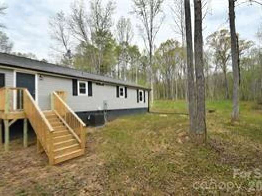 140 Overbrook Road, Salisbury, NC 28147.  MLS# CAR4349590, YatesRealty ID 20263. Back Deck and Back Yard