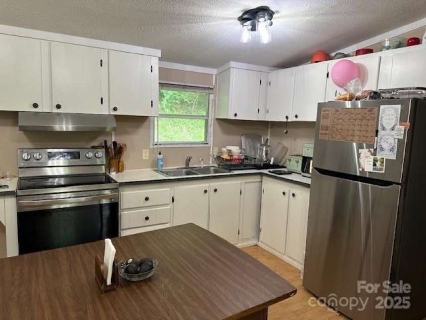 143 Hubert Mccall Drive, Balsam Grove, NC 28708.  MLS# CAR4269967, YatesRealty ID 20267. 