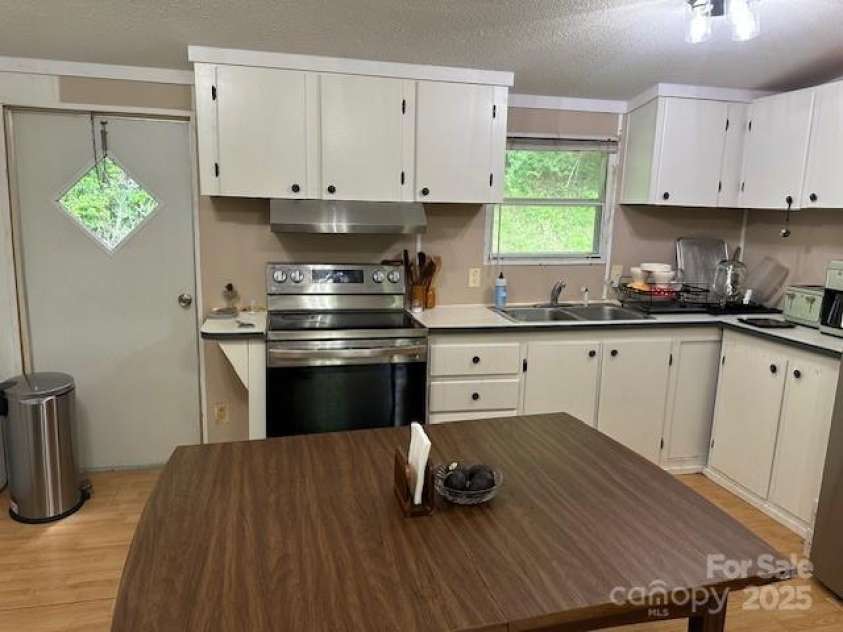 143 Hubert Mccall Drive, Balsam Grove, NC 28708.  MLS# CAR4269967, YatesRealty ID 20267. 