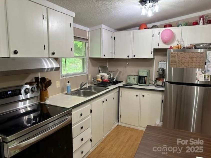 143 Hubert Mccall Drive, Balsam Grove, NC 28708.  MLS# CAR4269967, YatesRealty ID 20267. 