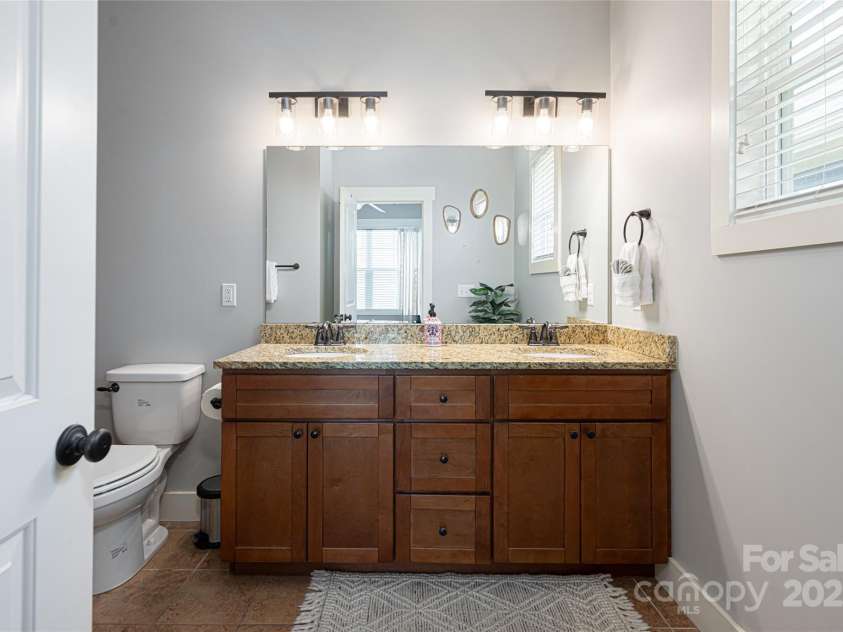 31 Byrdcliffe Lane, Asheville, NC 28805.  MLS# CAR4257639, YatesRealty ID 20268. Ensuite bathroom