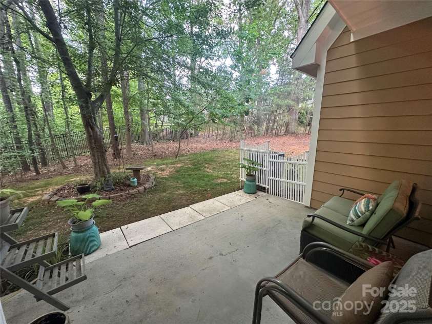 15318 Coventry Court Lane, Charlotte, NC 28277.  MLS# CAR4252631, YatesRealty ID 20270. Rear Private Patio Which Overlooks Woods