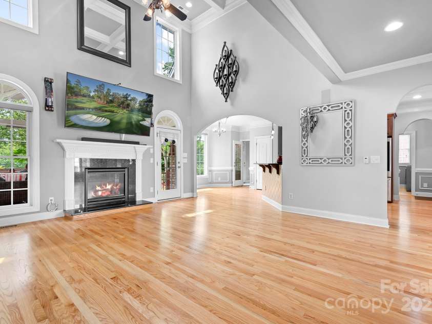9112 Butterfly Court, Gastonia, NC 28056.  MLS# CAR4267047, YatesRealty ID 20271. 2 Story Great Room with Coffered ceiling opens up to the sizable kitchen.