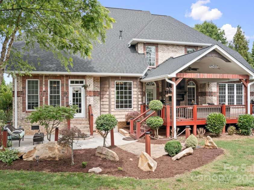 9112 Butterfly Court, Gastonia, NC 28056.  MLS# CAR4267047, YatesRealty ID 20271. Back View from back right side.