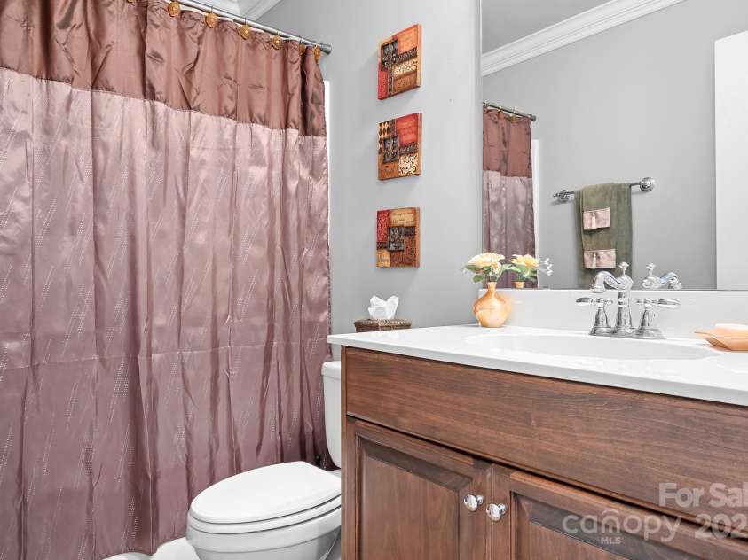 9112 Butterfly Court, Gastonia, NC 28056.  MLS# CAR4267047, YatesRealty ID 20271. Ensuite bathroom to Guest Bedroom.