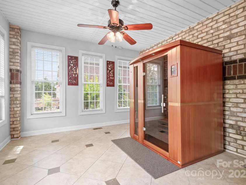9112 Butterfly Court, Gastonia, NC 28056.  MLS# CAR4267047, YatesRealty ID 20271. Four Seasons Sun Room.  Dynamic Infrared Lugano Sauna available for purchase outside of transaction.