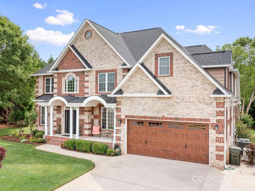 9112 Butterfly Court, Gastonia, NC 28056.  MLS# CAR4267047, YatesRealty ID 20271. Lovely full brick home with new garage door.