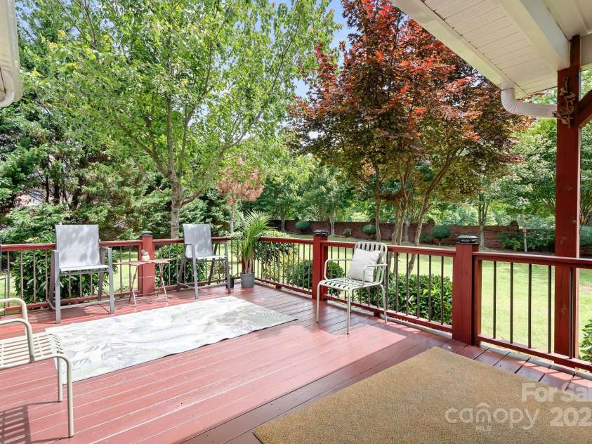 9112 Butterfly Court, Gastonia, NC 28056.  MLS# CAR4267047, YatesRealty ID 20271. This deck is double in size for great parties and spreading out with friends and family.