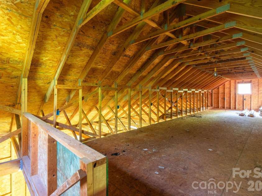 445 Quail Drive, Salisbury, NC 28147.  MLS# CAR4373863, YatesRealty ID 20272. Detached 3 car garage unfinished loft