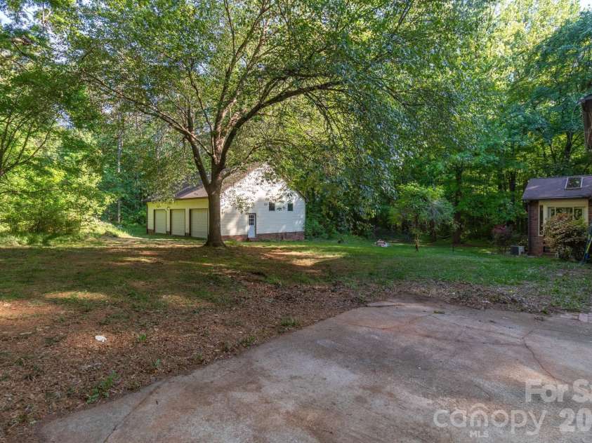 445 Quail Drive, Salisbury, NC 28147.  MLS# CAR4373863, YatesRealty ID 20272. Yard & detached 3 car garage