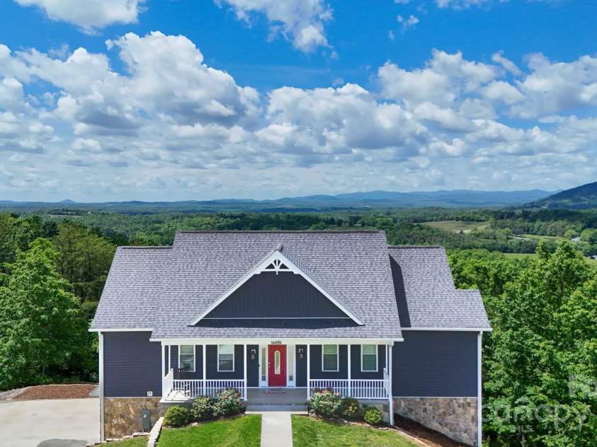 7768 Pinecone Lane, Hickory, NC 28602.  MLS# CAR4257441, YatesRealty ID 20276. Aerial front of home and view behind