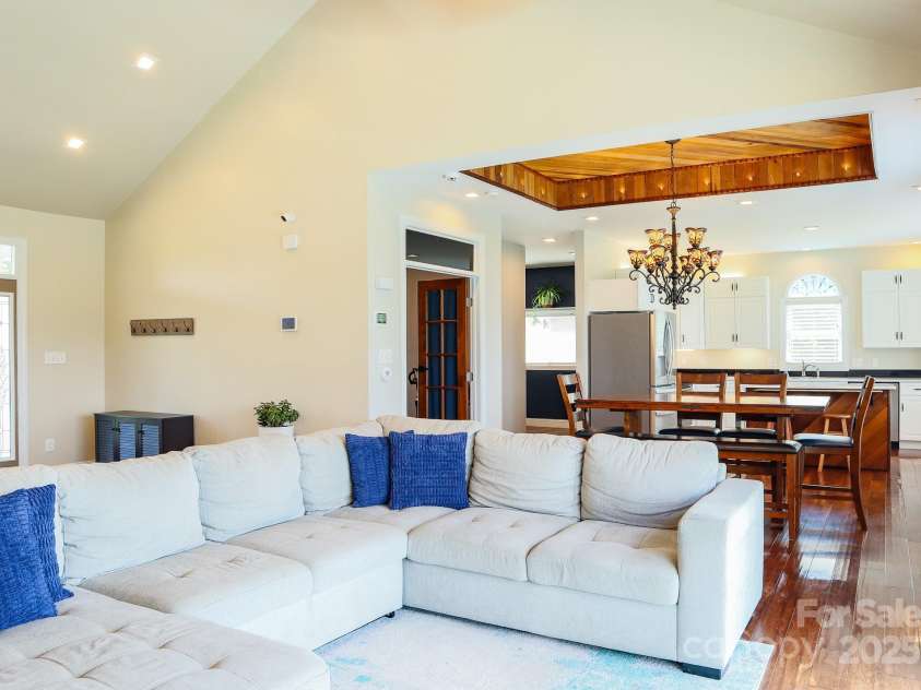 7768 Pinecone Lane, Hickory, NC 28602.  MLS# CAR4257441, YatesRealty ID 20276. LR toward dining area bedroom and laundry room