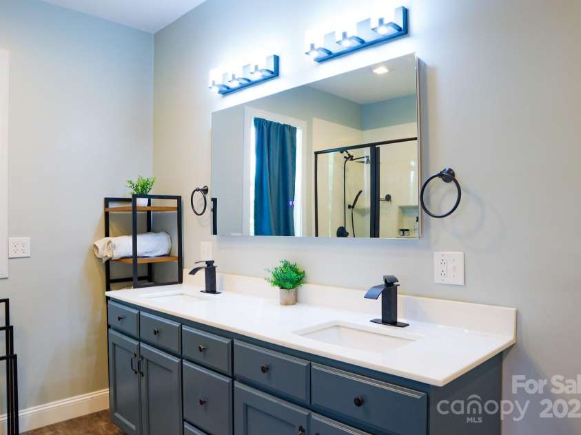 7768 Pinecone Lane, Hickory, NC 28602.  MLS# CAR4257441, YatesRealty ID 20276. Primary double sink vanity