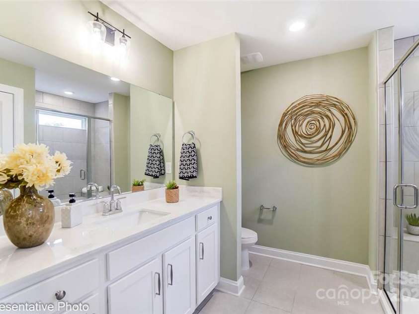 4236 Black Court, Harrisburg, NC 28075.  MLS# CAR4221139, YatesRealty ID 20278. Primary bath features a double sink vanity and shower