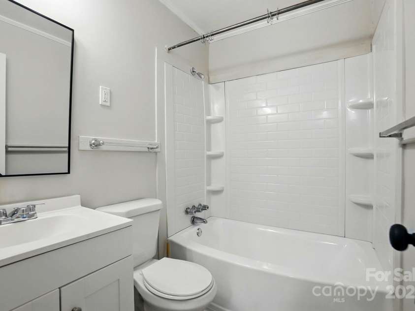 1412 Wembley Drive, Charlotte, NC 28205.  MLS# CAR4257976, YatesRealty ID 20281. Bathroom in 2 bd unit
