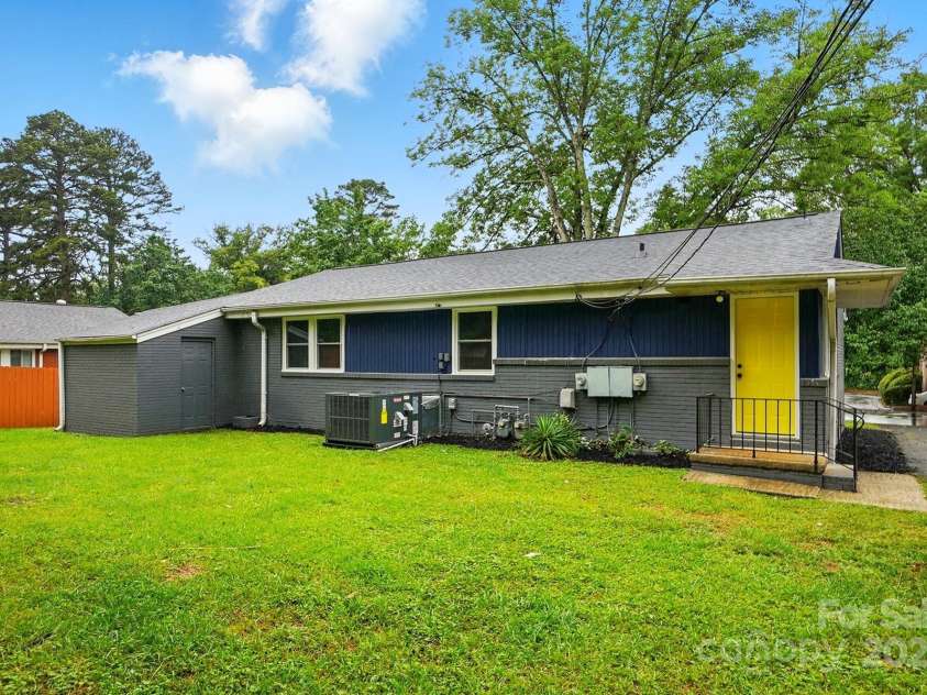 1412 Wembley Drive, Charlotte, NC 28205.  MLS# CAR4257976, YatesRealty ID 20281. Driveway and back door entrance for 2bdrm unit