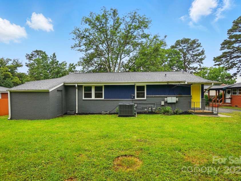 1412 Wembley Drive, Charlotte, NC 28205.  MLS# CAR4257976, YatesRealty ID 20281. Driveways on either side of duplex
