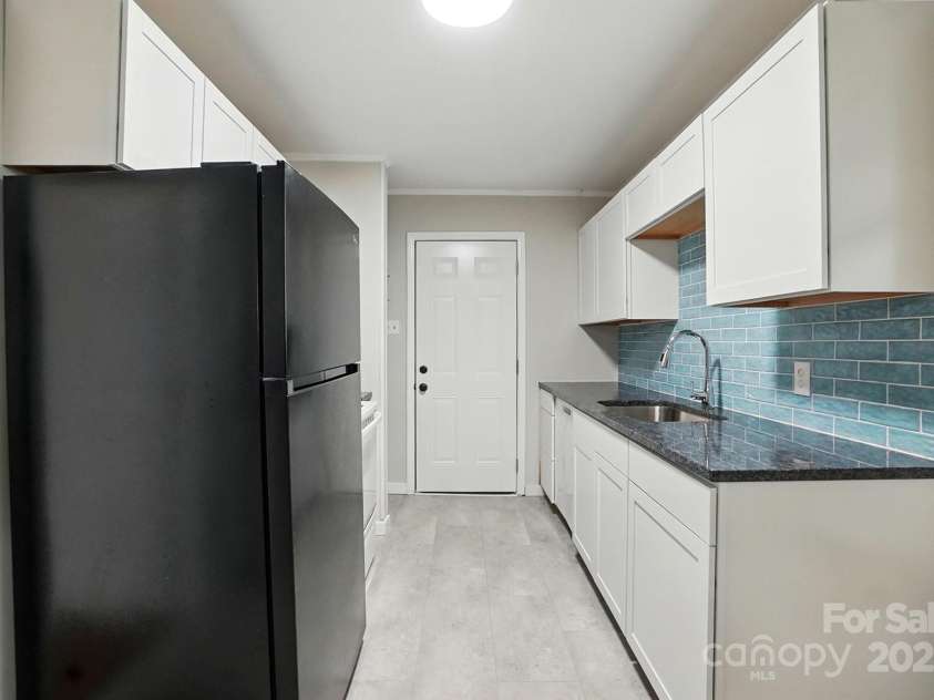 1412 Wembley Drive, Charlotte, NC 28205.  MLS# CAR4257976, YatesRealty ID 20281. Kitchen in 3bdrm unit