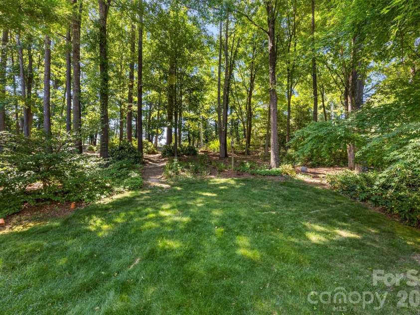625 Greenbrook Parkway, Matthews, NC 28104.  MLS# CAR4378855, YatesRealty ID 20288. Private back yard