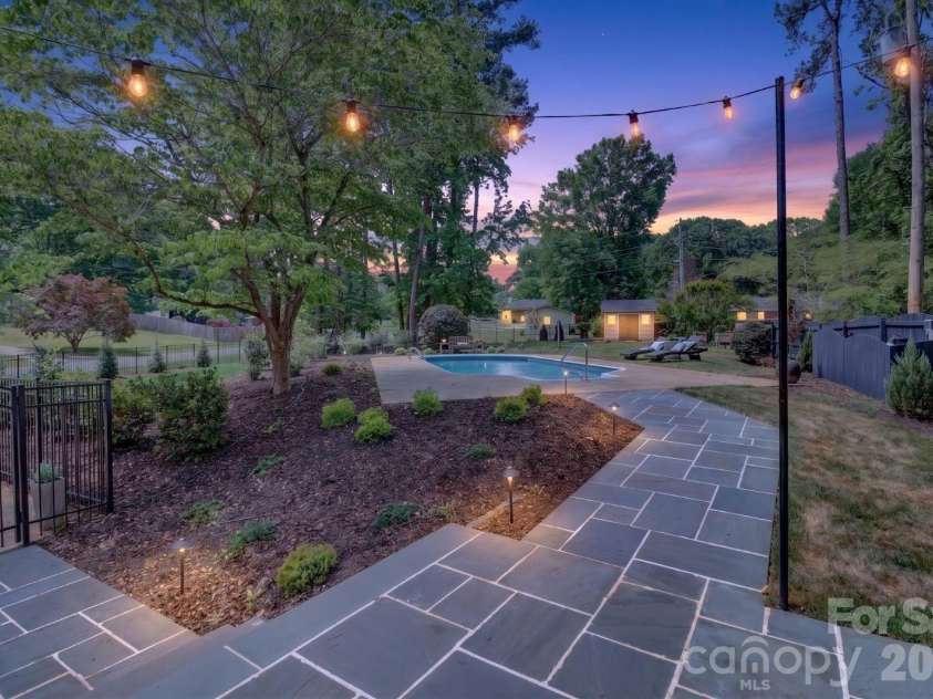5601 Beaver Dam Lane, Mint Hill, NC 28227.  MLS# CAR4373202, YatesRealty ID 20295. Ai Generated