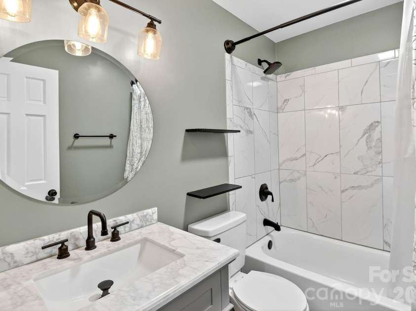 5601 Beaver Dam Lane, Mint Hill, NC 28227.  MLS# CAR4373202, YatesRealty ID 20295. Full bath lower level
