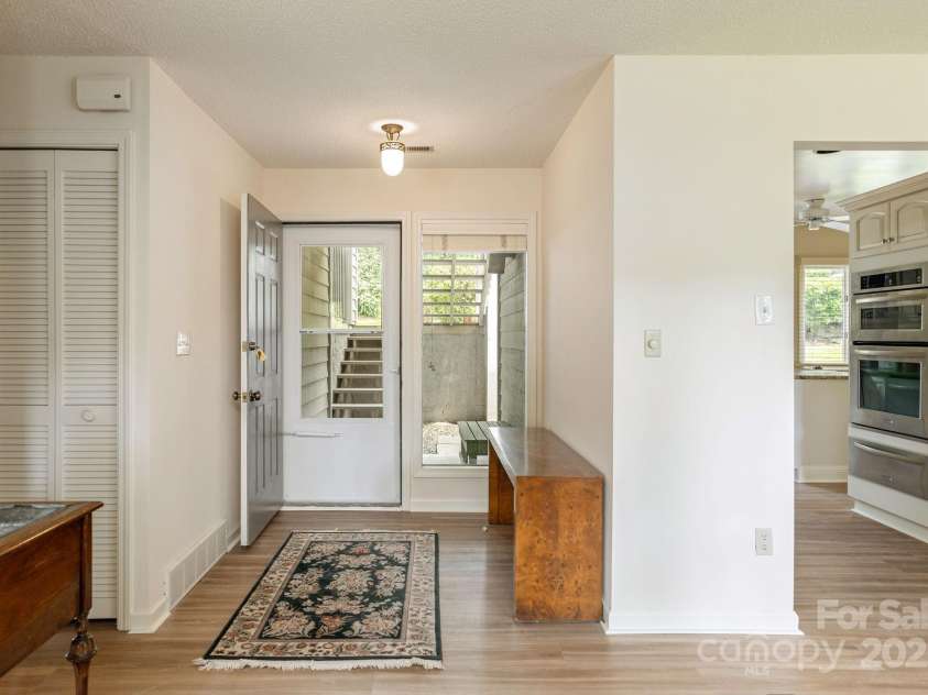 103 GOLFSIDE Drive, Flat Rock, NC 28731.  MLS# CAR4271891, YatesRealty ID 20296. 