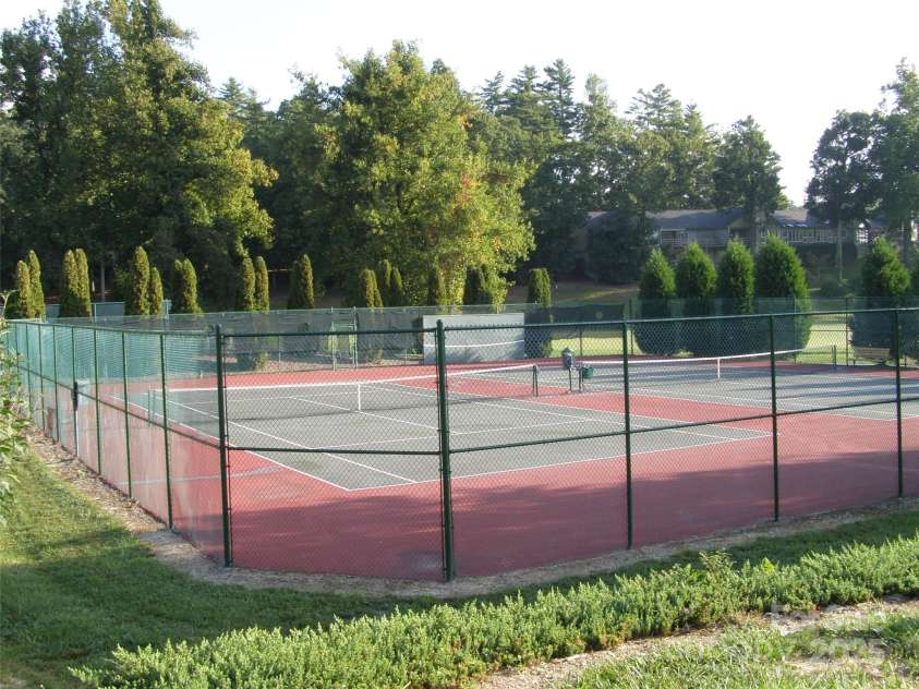 103 GOLFSIDE Drive, Flat Rock, NC 28731.  MLS# CAR4271891, YatesRealty ID 20296. 