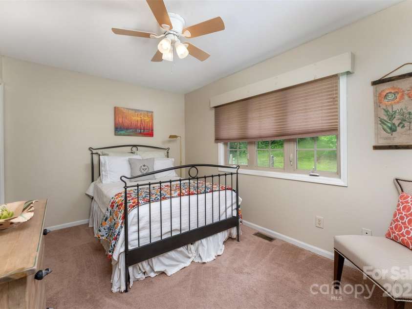 59 Grace Ridge Road, Waynesville, NC 28786.  MLS# CAR4265634, YatesRealty ID 20298. Bedroom with bath