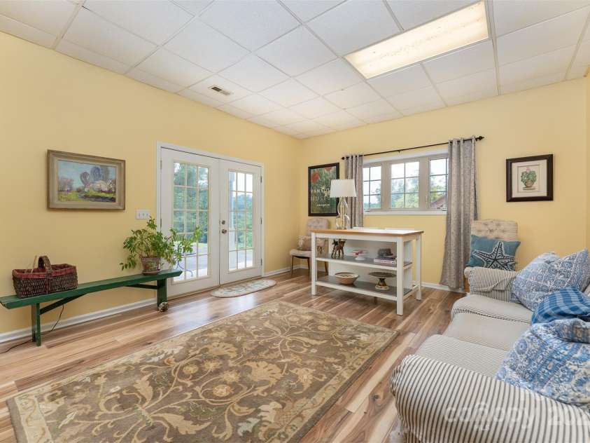 59 Grace Ridge Road, Waynesville, NC 28786.  MLS# CAR4265634, YatesRealty ID 20298. French doors for easy outside access