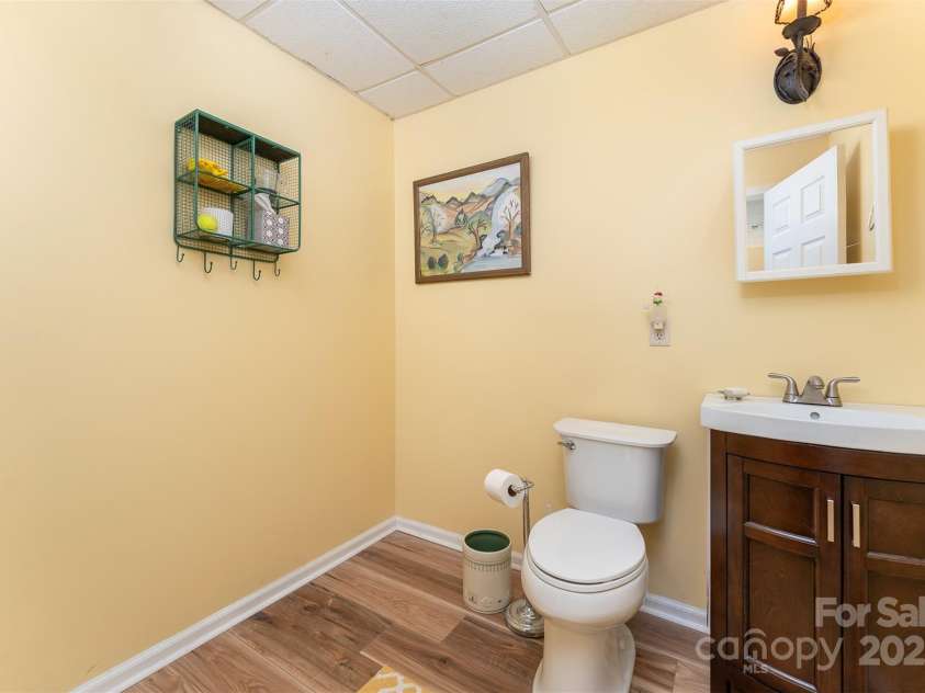 59 Grace Ridge Road, Waynesville, NC 28786.  MLS# CAR4265634, YatesRealty ID 20298. Half bath in basement