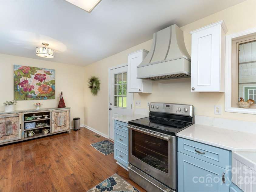 59 Grace Ridge Road, Waynesville, NC 28786.  MLS# CAR4265634, YatesRealty ID 20298. Kitchen dining space entry from carport