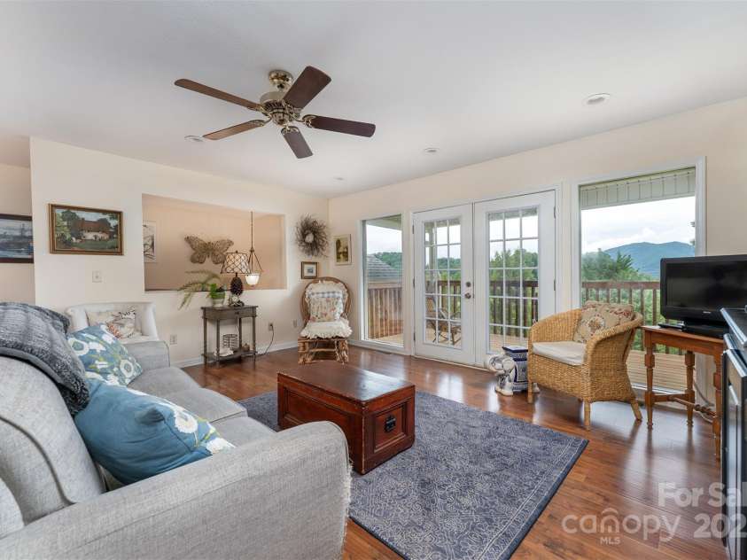 59 Grace Ridge Road, Waynesville, NC 28786.  MLS# CAR4265634, YatesRealty ID 20298. Living room with mountain view