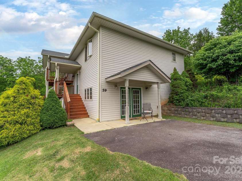 59 Grace Ridge Road, Waynesville, NC 28786.  MLS# CAR4265634, YatesRealty ID 20298. Lower drive to access front door and basement