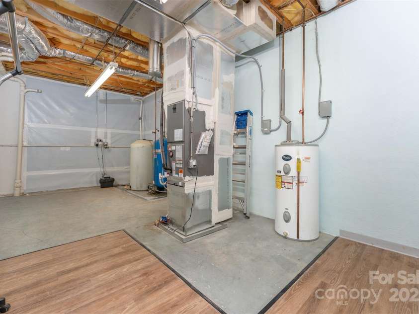 59 Grace Ridge Road, Waynesville, NC 28786.  MLS# CAR4265634, YatesRealty ID 20298. Other portion of basement