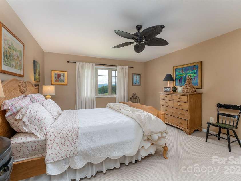 59 Grace Ridge Road, Waynesville, NC 28786.  MLS# CAR4265634, YatesRealty ID 20298. Primary bedroom