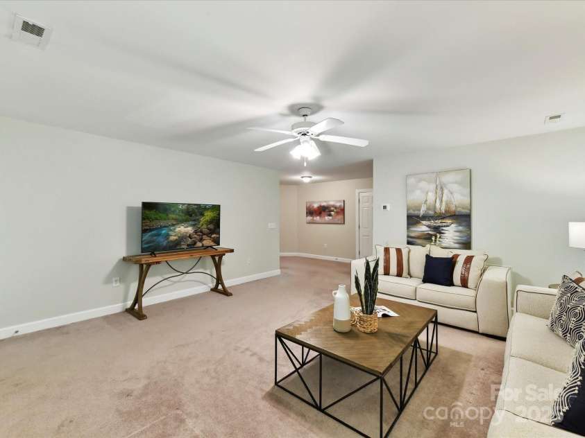 2215 Henery Tuckers Court, Charlotte, NC 28270.  MLS# CAR4267429, YatesRealty ID 20299. Basement den