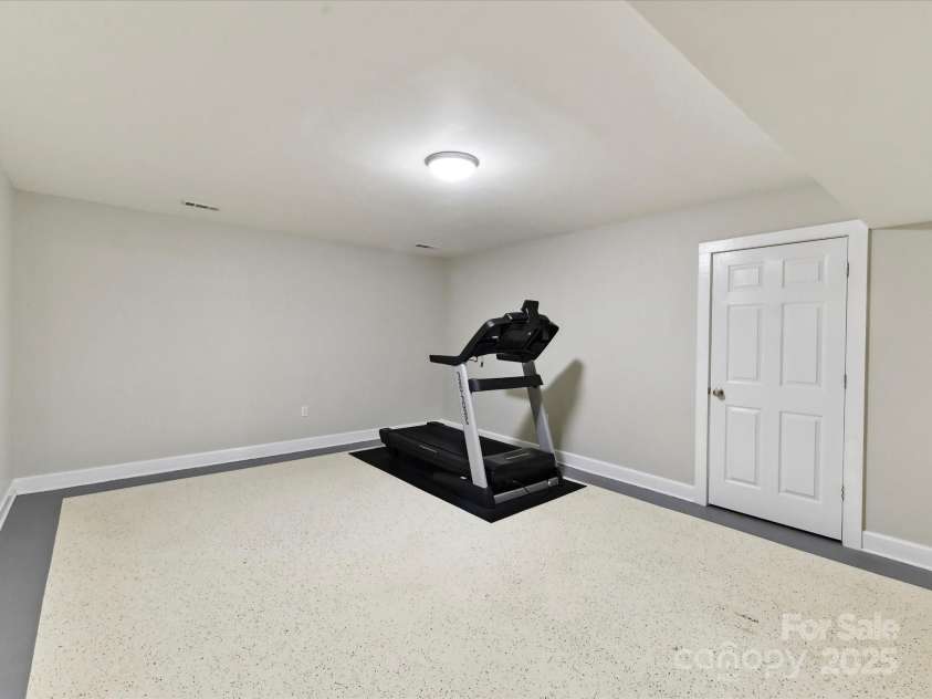 2215 Henery Tuckers Court, Charlotte, NC 28270.  MLS# CAR4267429, YatesRealty ID 20299. Flex space in basement makes for a great exercise room, movie theater, craft room, play room etc!