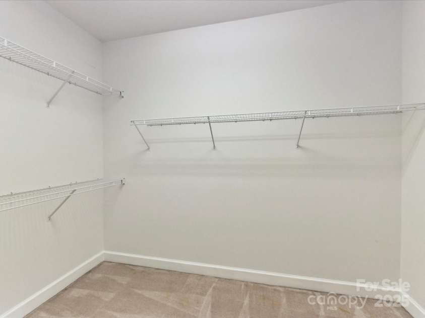 2215 Henery Tuckers Court, Charlotte, NC 28270.  MLS# CAR4267429, YatesRealty ID 20299. Large primary bedroom walk-in closet!