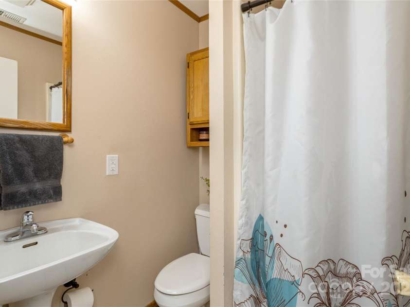 236 Why Worry Boulevard, Canton, NC 28716.  MLS# CAR4235759, YatesRealty ID 20301. Full bath with standing shower.