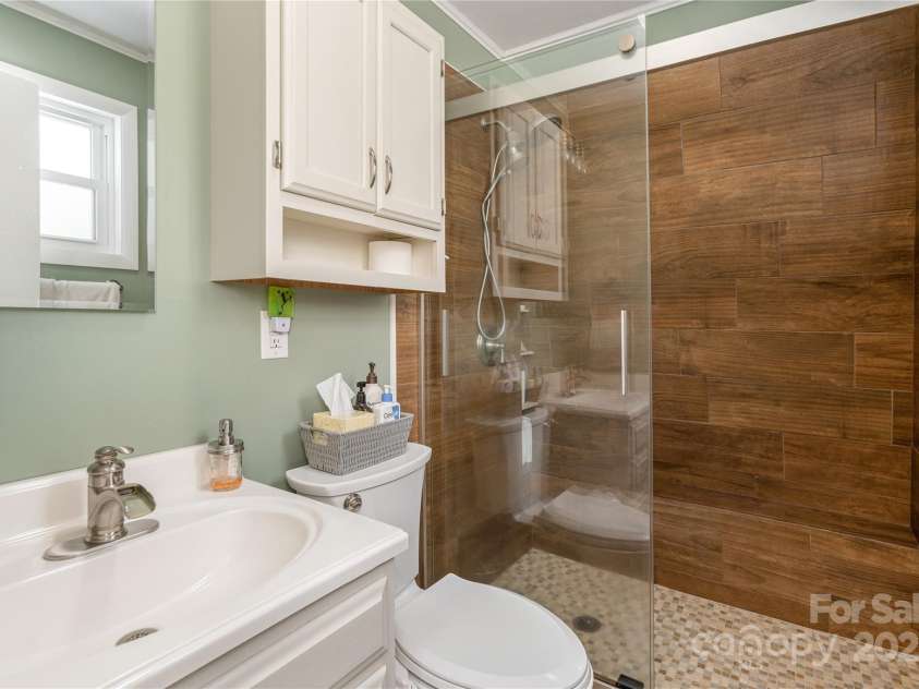 236 Why Worry Boulevard, Canton, NC 28716.  MLS# CAR4235759, YatesRealty ID 20301. Full updated bath upstairs.  Gorgeous tile work!
