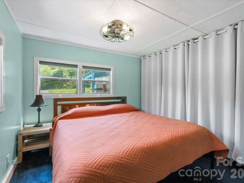 72 Amos Creek Road, Marshall, NC 28753.  MLS# CAR4379561, YatesRealty ID 20302. A wall of closet space provides ample storage.