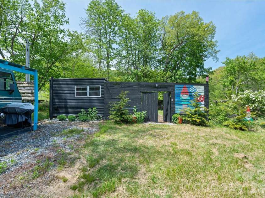 72 Amos Creek Road, Marshall, NC 28753.  MLS# CAR4379561, YatesRealty ID 20302. Your retreat awaits.
