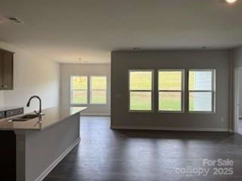 156 Ella Claire Drive, York, SC 29745.  MLS# CAR4270591, YatesRealty ID 20303. Family Room & Kitchen